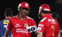 Punjab qualify for IPL play-offs after shaky win against Delhi