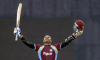 Samuels fires hundred as crisis-hit Windies stun World champs India