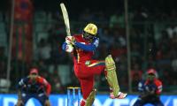 Starc, Gayle help Bangalore crush Delhi by 10 wickets