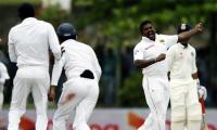 Herath spins Sri Lanka to comeback win as India's batting flops