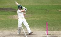 PHOTOS: Smith breaks Bradman's record to give Australia big lead