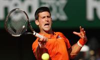 Wawrinka enters French Open final; Storm halts Djokovic vs Murray semi