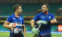 England beat Afghanistan in rain-swept Sydney