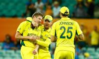 Australia knock defending champs India out of World Cup