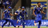 Mumbai's play-off hopes alive after narrow win over KKR