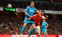 EPL PHOTOS: Sunderland eke out draw at Arsenal, avoid relegation threat