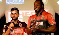 PHOTOS: Kohli, Gayle unveil RCB's jersey for IPL 9