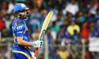 IPL PHOTOS: Rohit, Pollard help Mumbai ease past RCB