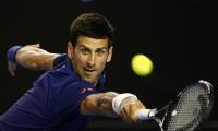 Djokovic denies report that 2007 loss to Santoro was fixed