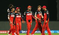 IPL PHOTOS: Kohli's fourth ton helps Bangalore move up to second