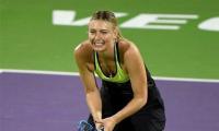 Sharapova loses on return to exhibition tennis