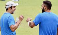 PHOTOS: Kohli, Gambhir bury hatchet; shares laugh during practice