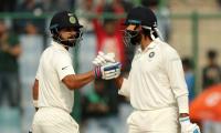 Record breaking Kohli, solid Vijay punish Sri Lanka