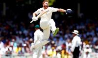 PHOTOS: Smith holds firm as Australia rein in England