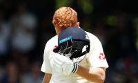 Bairstow celebrates Ashes ton with helmet head-butt