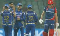 Mumbai spank Daredevils by 146 runs, seals play-offs spot