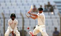 Gutsy Warner leads Australia's strong reply on Day 2