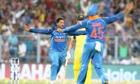 PIX: Kuldeep 'tricks' as India down Aus by 50 runs, lead series 2-0