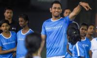 PIX: Dhoni takes to the football field