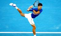 PHOTOS: Djokovic through to semis after Nishikori retires