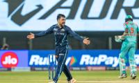 IPL PIX: Rashid, Gill star as GT seal play-off berth