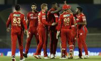 IPL PIX: Punjab Kings demolish RCB to stay alive