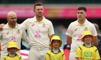 Covid positive Renshaw named in Aussie XI