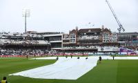 PIX: Rain halts Aus chase on Day 4