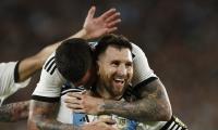 Messi leads Argentina win in 1st game as world champs