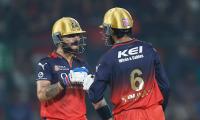 PIX: Krunal shines as RCB beat DC to go top of IPL