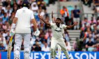 PIX: Root falls, tempers flare; India roar back