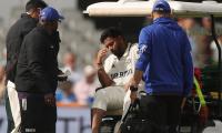 PIX: Pant stretchered off with nasty foot injury!