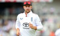 Root goes level with Dravid for Test record