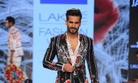 Karan Tacker wears flowers and gets it right too!