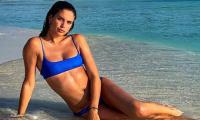 Beach bum! Sara Sampaio soaks up the sun in the Maldives