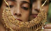 Attractive fin instruments needed to check gold demand: Rajan