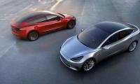 Tesla puts pedal to the metal, 500,000 cars planned in 2018