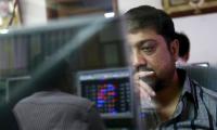 Selling in banking, auto shares pull markets down