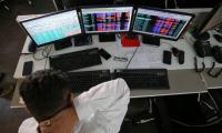 Bank, auto stocks drag Sensex down 289 points