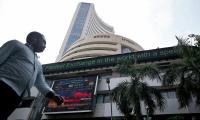 Stock markets end with marginal gains in volatile trade