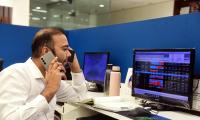 Sensex drops 452 points dragged by bank stocks