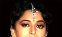 Quiz: What is Madhuri Dixit's profession in Anjaam?