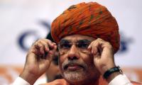 Modi attacks Khurshid over remarks against EC, SC