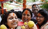 PHOTOS: NaMo bhakts party on the streets