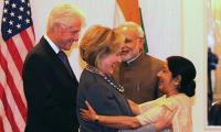 New grandparents Clintons keep their date with Modi