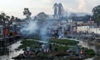 Mass cremations in Nepal as quake body count rises