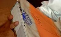 Modi signs 'flag' for chef, sparking controversy; Govt denies