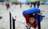 PHOTOS: This Gaza boy twists and turns his body like no other