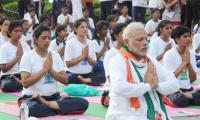 PM, 57 ministers to mark Yoga Day events across India