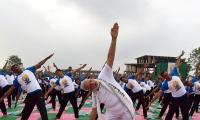 Yoga is not a religious activity, embrace it: PM Modi